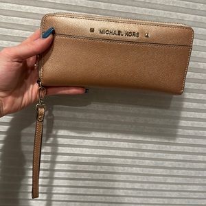 Michael Kors rose gold wallet/wristlet